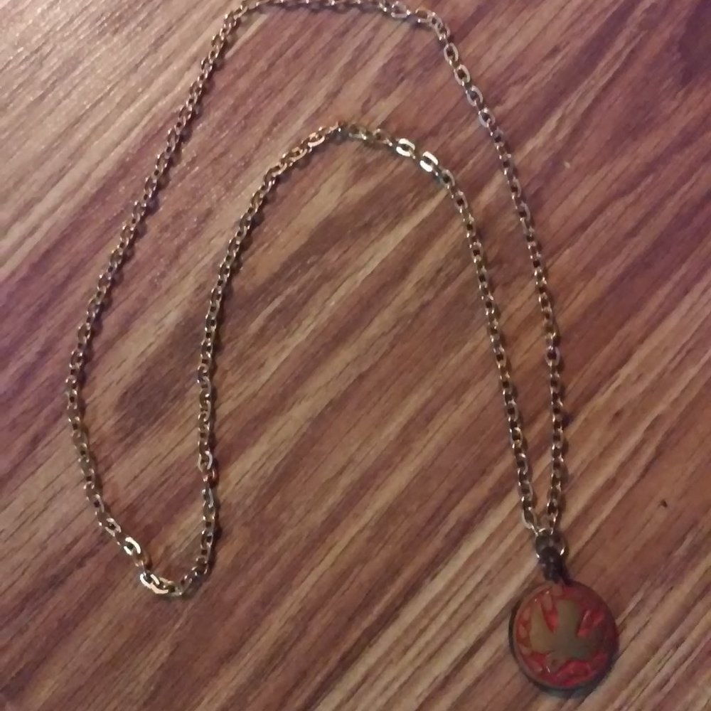 Necklace Back Reads: Terra Guild Israel Gold & Red Hangs 13 1/2"